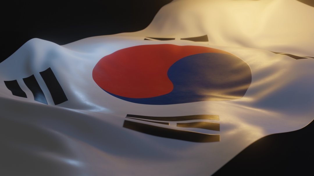 south-korea-flag-close-up-with-warm-lighting-on-black-background.jpg